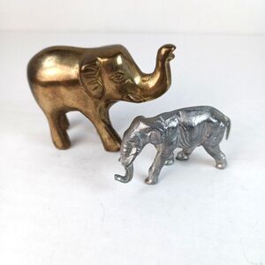 Set Cast Iron Elephant Trunk Down 1.25x2" And Brass Elephant Trunk Up 2.5x2"